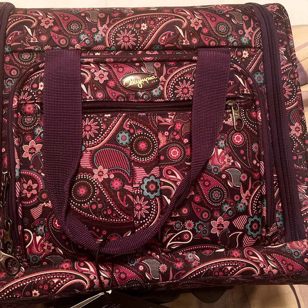 Laptop bag on wheels with adjustable handle